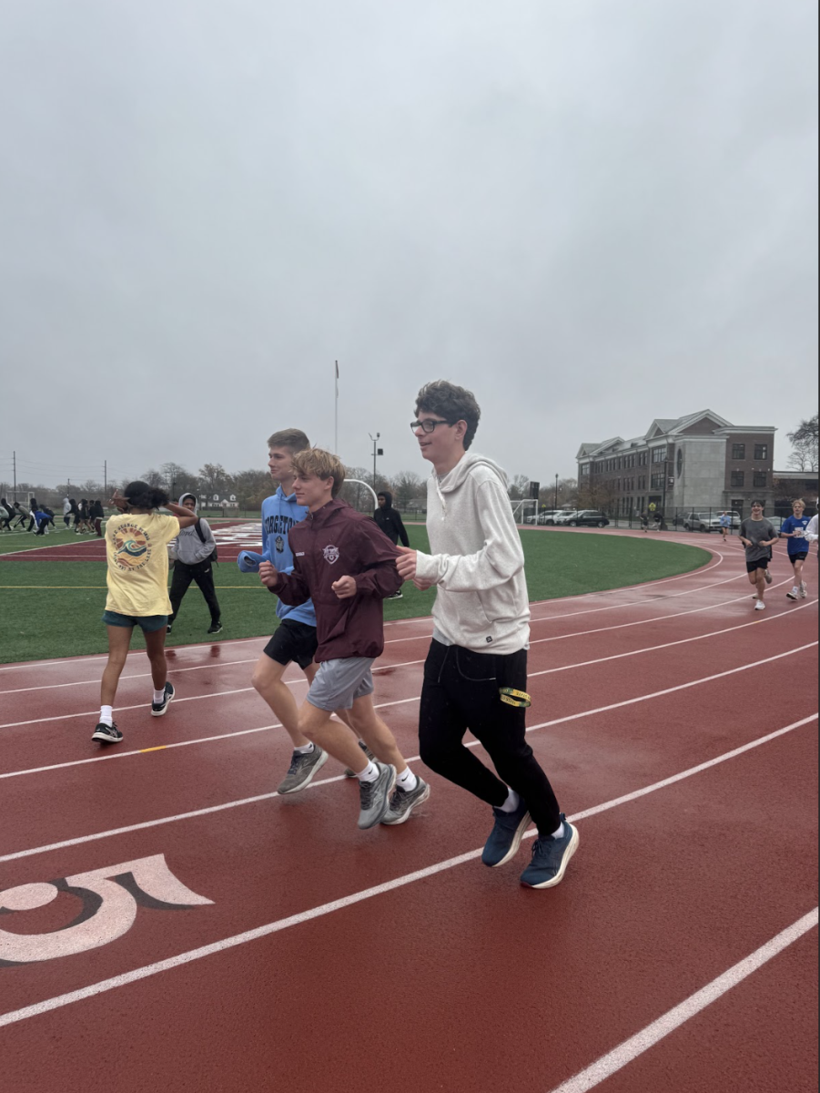 The boy’s track team begins their run during practice after school on November 21st, on the Clifton Laplatney track. 
John Yuli (11), Mason Wernersbach (11), and Cole Lyons (12). 
